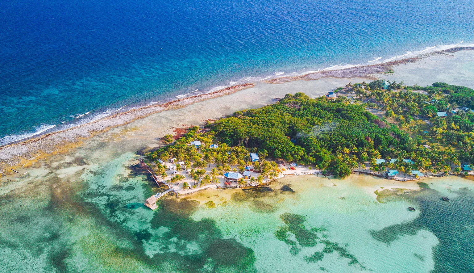 Aerial view of tropical island at Glover's Reef Atoll in Belize