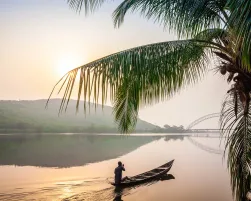 Paddling in traditional wooden canoe