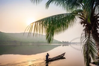 Paddling in traditional wooden canoe