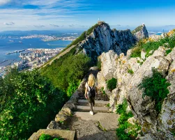 Girl hiking on mountain path in Gibraltar