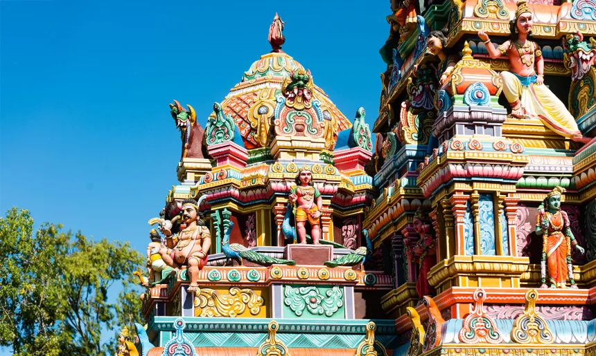 Colourful Indian temple in Mauritius Island. Close-up on sculptures and statues of deities.