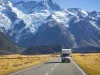 campervan on road with mountain view