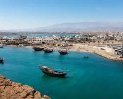 Traditional wooden dhow boats and the shipbuilding district in Sur, Oman