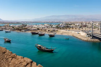 Traditional wooden dhow boats and the shipbuilding district in Sur, Oman