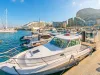 Sailboats, motorboats, and super yachts moored at Ocean Village, Gibraltar
