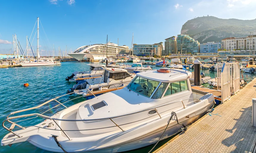 Sailboats, motorboats, and super yachts moored at Ocean Village, Gibraltar