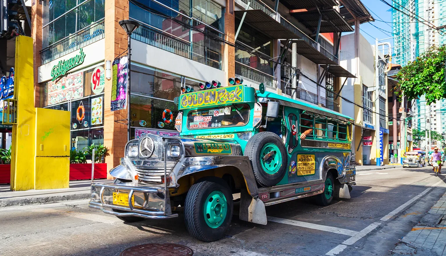 Jeepneys are popular public transport in the Manila city in Philippines, they made from old US military jeeps