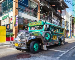 Jeepneys are popular public transport in the Manila city in Philippines, they made from old US military jeeps