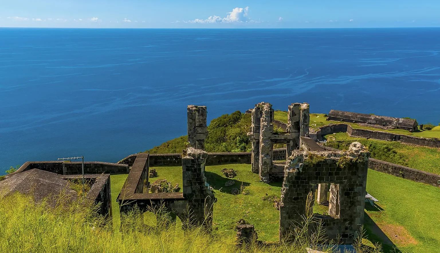 A view out to sea across the ruins of Brimstone Hill Fort in St Kitts