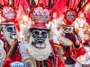 man in red mask at The festival of the Santísima Trinidad