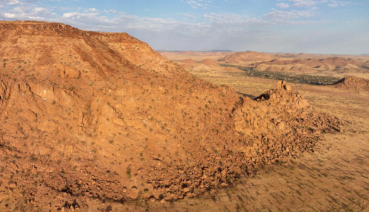 Red granite rocks and hills nearby Twyfelfontein, Namibia