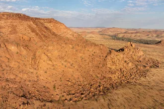 Red granite rocks and hills nearby Twyfelfontein, Namibia