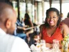 Woman enjoying wine at a restaurant