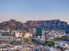 Wide angle shot of Cape Town city central business district and table mountain in the background during sunset, South Africa